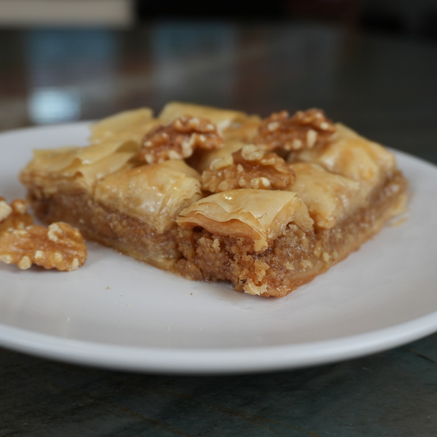 A piece of Baklava takes me right back to my childhood. It’s my mom’s recipe, lovingly adapted but forever hers—the one she made and shared every holiday. Keeping her tradition alive feels like the sweetest gift… and it finally gives my sister a break from making the extra pan and a trip to the post office. 

#Baklava #FullBloomBites #SweetTraditions #savorthegoodlife