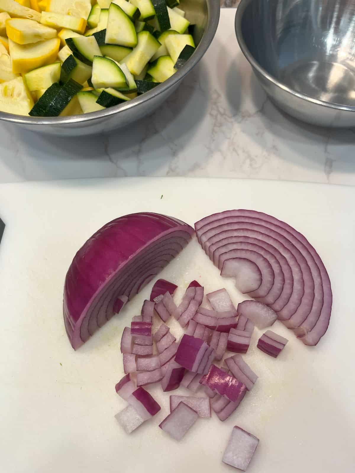 FBB_Side.Onion.Diced_Zucchini.Squash.Bowl.1200x1600. Photo showing diced red onion.