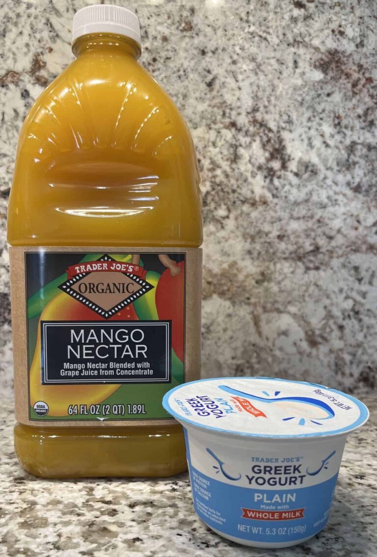 Trader Joe's Mango Nectar 64 ounce and Plain Whole Milk Greek Yogurt in their containers.
