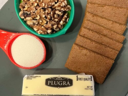 Ingredients for walnut pie crust: walnuts, graham cracker, sugar, and butter.