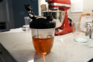 Baklava syrup ready for cooling in a heat‑proof container after boiling.